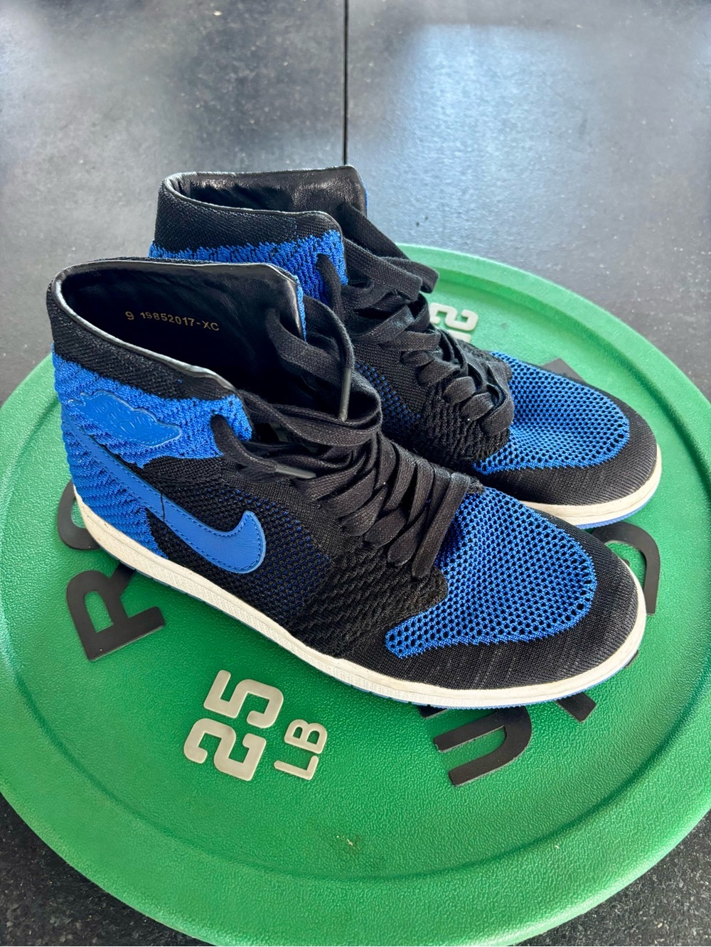 Nike Air Jordan 1 Flyknit High-Top Sneakers in Black & Royal Blue